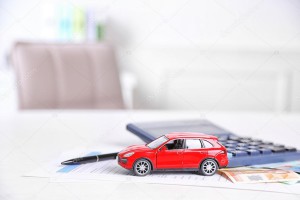 depositphotos_81522712-stock-photo-toy-car-money-documents-and